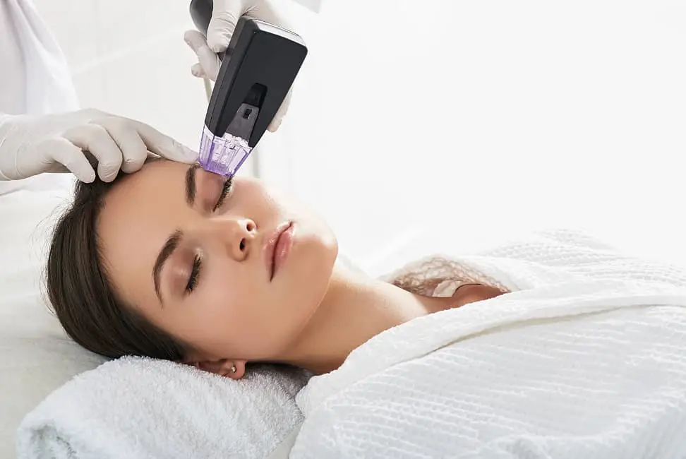 woman getting skin treatment